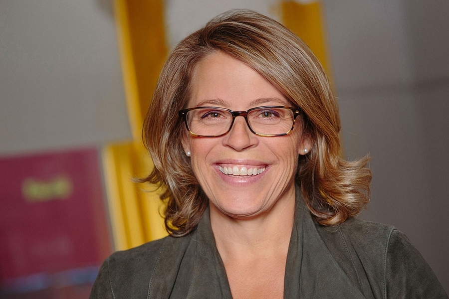 Photo of Katie Rae smiling at the camera