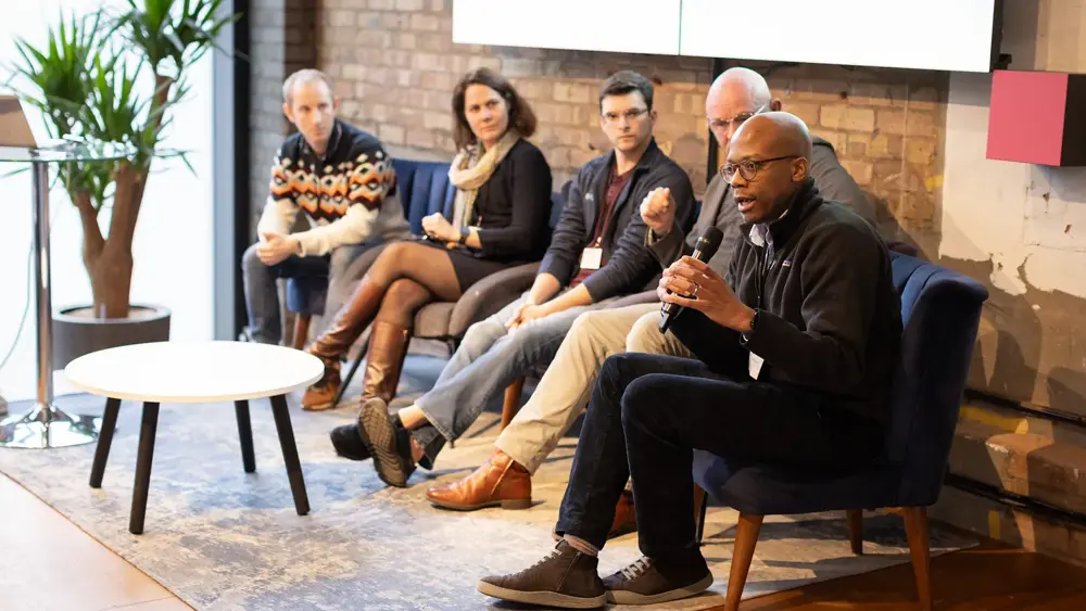 Creators on a panel at the Scaling Compute workshop