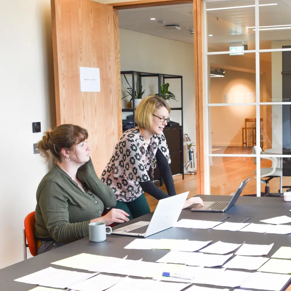 A photo of Sarah Bohndiek, Gemma Bale in an office
