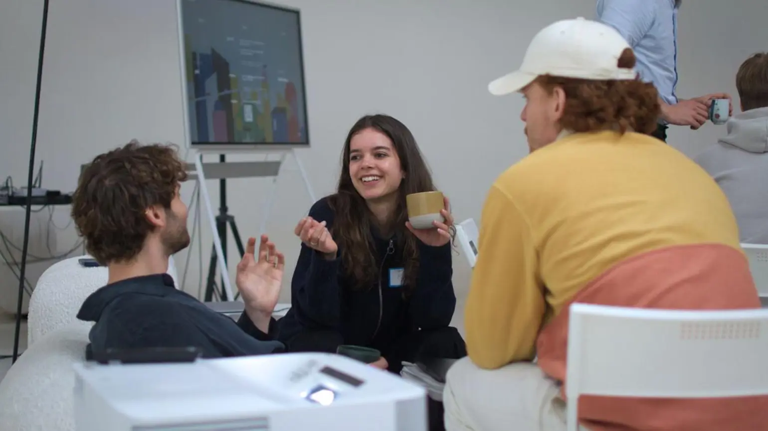 Group of people chatting at one of ARIA's Innovator Circle pilots